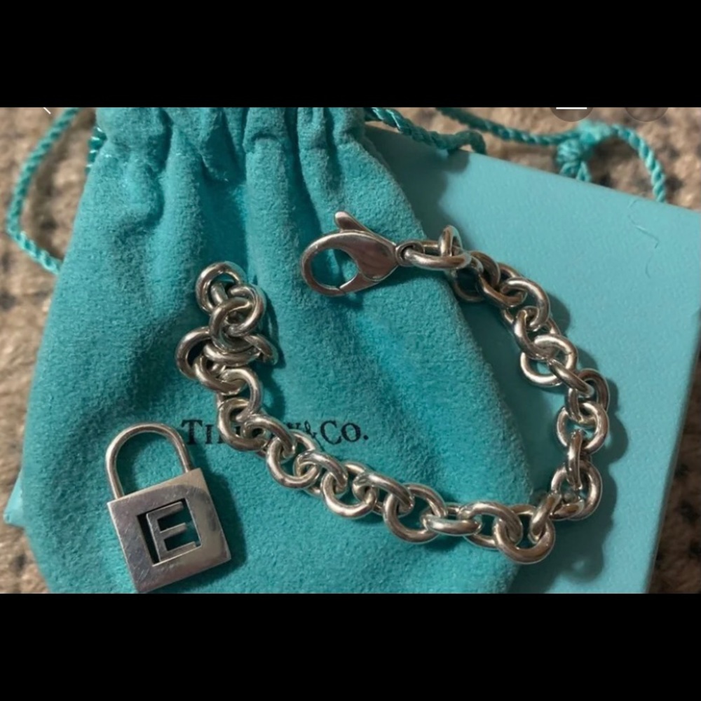 Genuine Tiffany bracelet with “E” lock charm